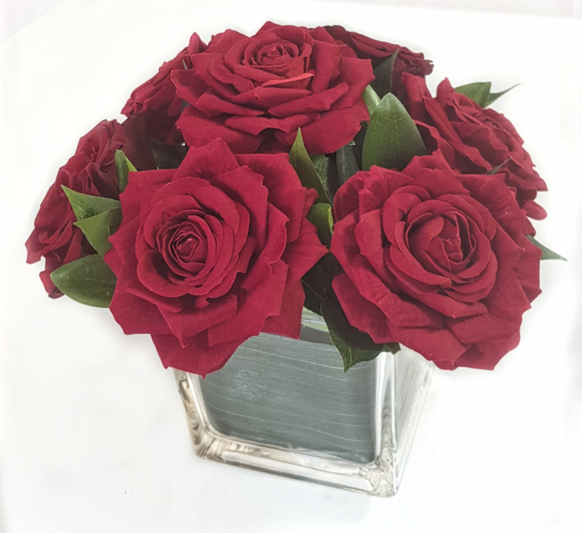 Artificial Red Roses In Clear Vase with Aspidistra